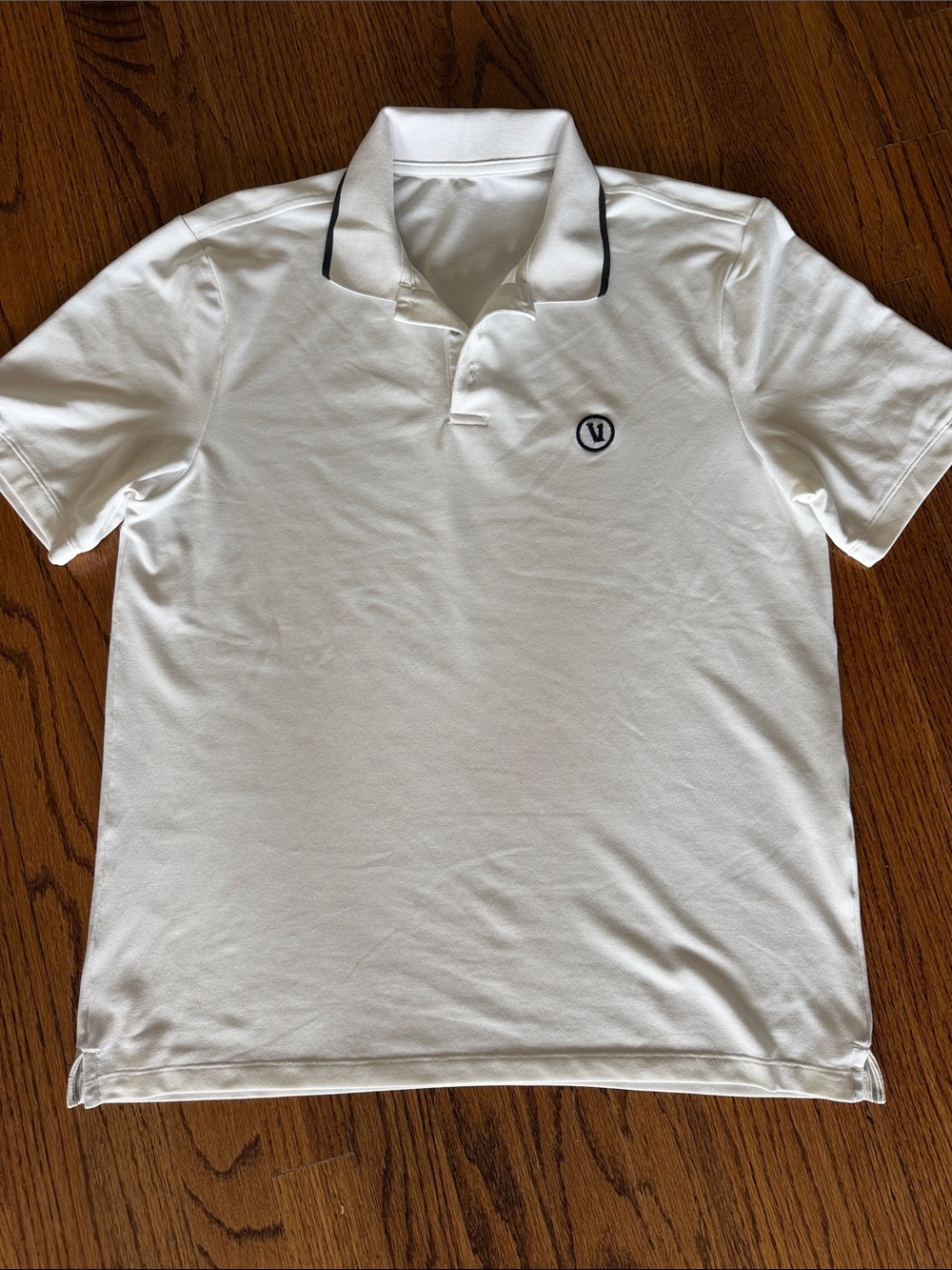 Vuori White Polo with Black Collar Trim and Chest V Logo